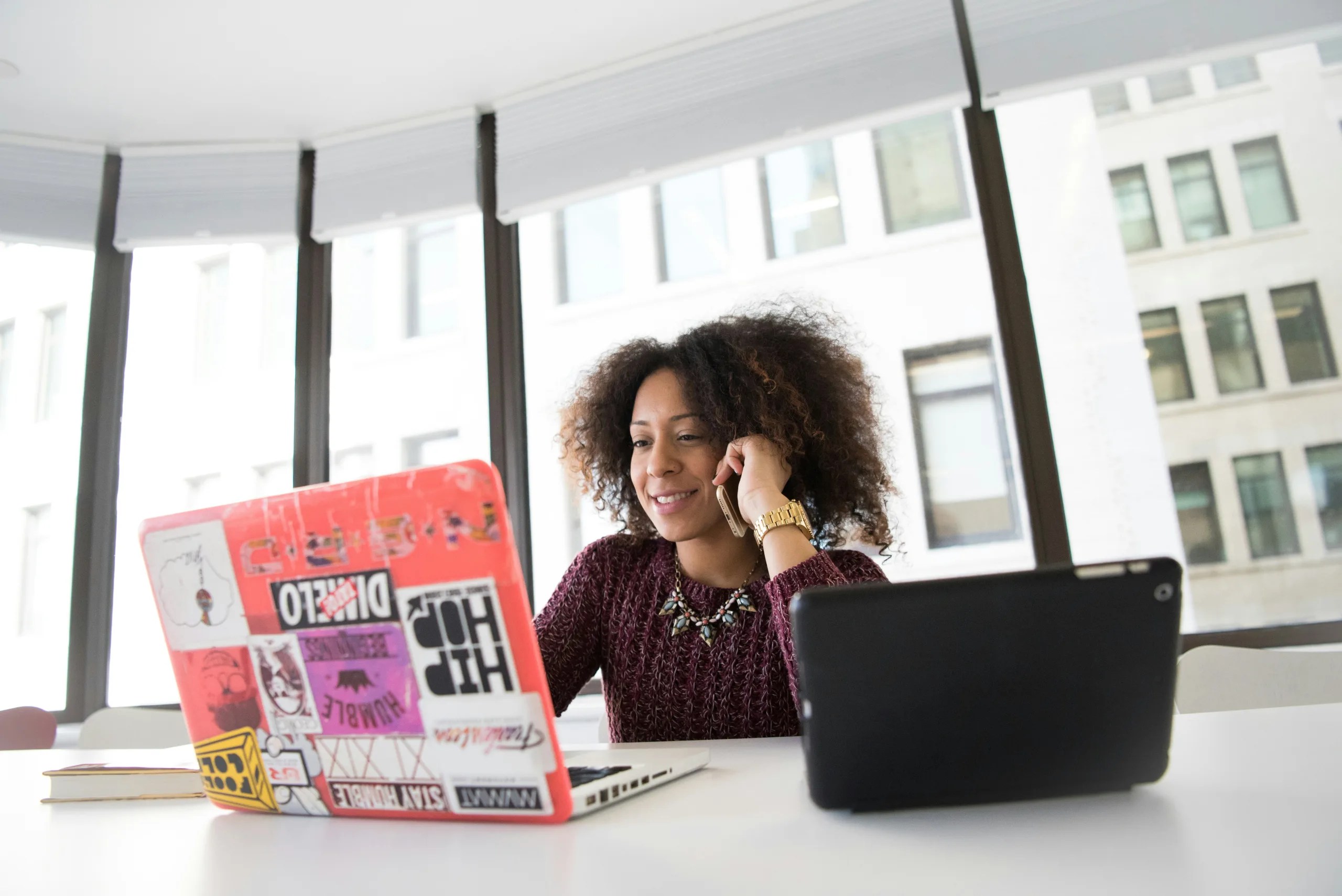 Woman looking at computer screen.